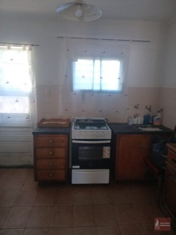 Casa 2 dorm, 60m² con cochera — Alberdi