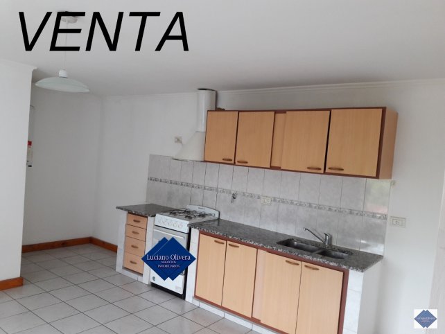 Depto 2 dorm, 60m² luminoso con cochera — Sarmiento 1500