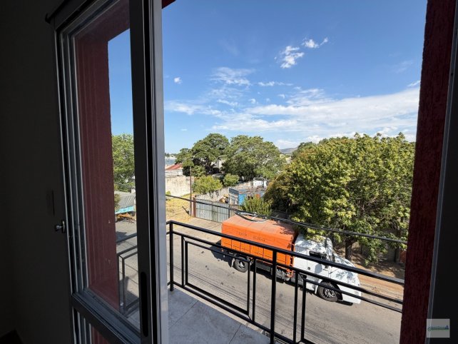 Depto 2 dorm, 60m² con cochera — Pelegrini al 1600