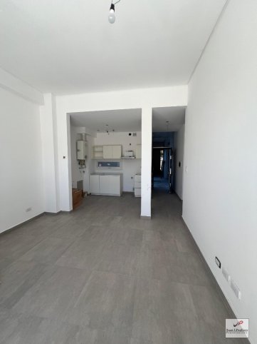 Depto 1 dorm, 52m² en planta baja con patio — Av. España