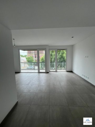 Depto 1 dorm, 94m² con 2 baños y balcón — España 300