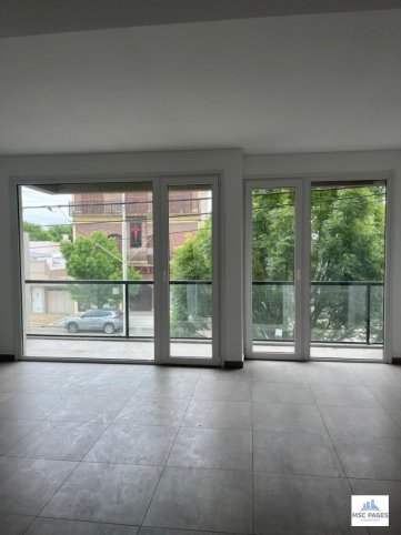 Depto 1 dorm, 94m² con 2 baños y balcón — España 300