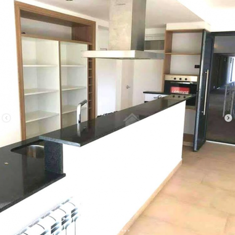 Depto 2 dorm, 100m² con cochera y ascensor — Garibaldi y Alberdi