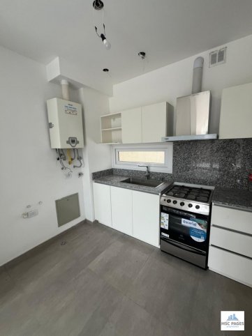 Depto 1 dorm, 52m² con patio privado — España 300