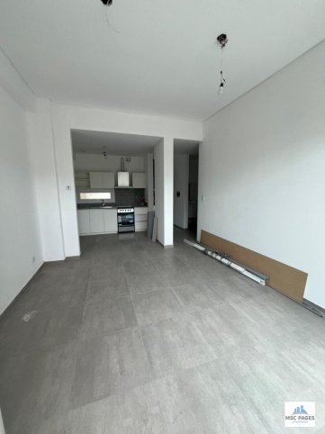 Depto 1 dorm, 52m² con patio privado — España 300