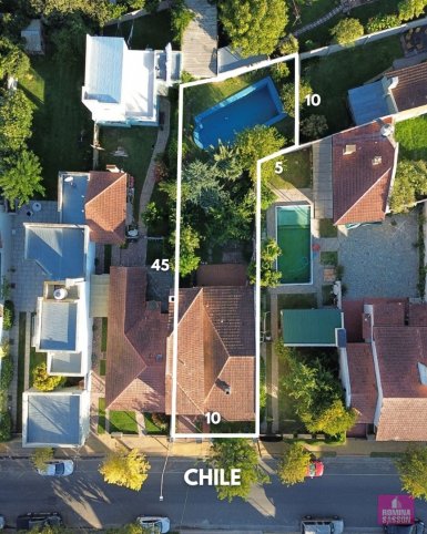 Casa tipo chalet 4 dorm, 180m² con parque y piscina — Chile 555