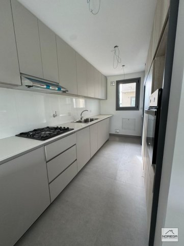 Depto 2 dorm, 117m² con cochera y ascensor — Av. Avellaneda