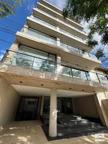 Depto 2 dorm, 117m² con cochera y ascensor — Av. Avellaneda