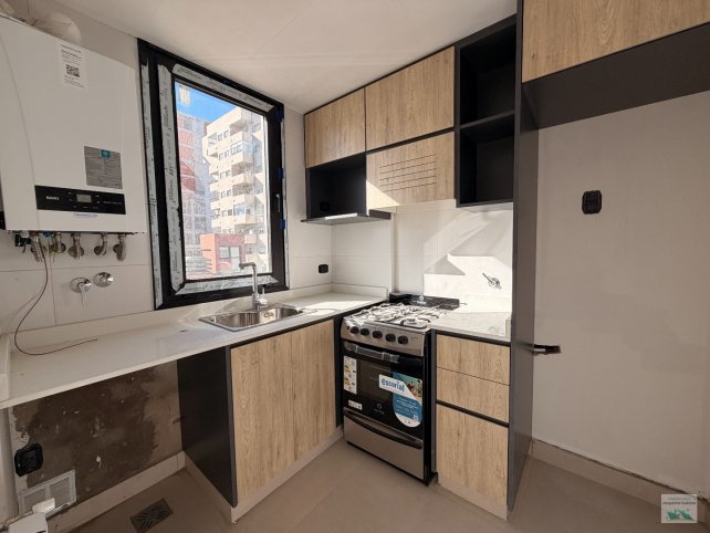 Depto a estrenar 1 dorm, 2 baños, cochera — Centro