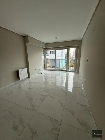 Depto 2 dorm, 85m² con cochera y ascensor — Chacabuco