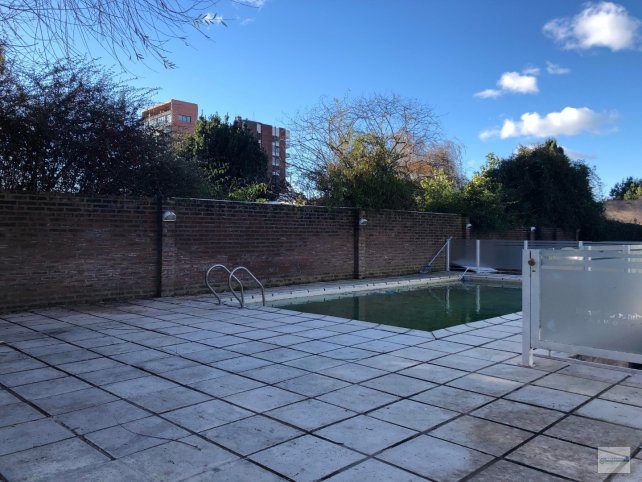 Depto 2 dorm, 2 baños, pileta y cochera — Paz al 200