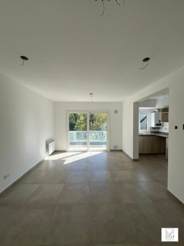 Depto 1 dorm, 52m² con cochera — Zona Calvario