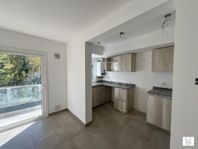 Depto 1 dorm, 52m² con cochera — Zona Calvario