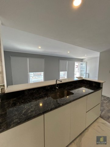 Depto 2 dorm, 87m² con cochera y ascensor — Centro
