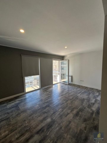 Depto 2 dorm, 87m² con cochera y ascensor — Centro
