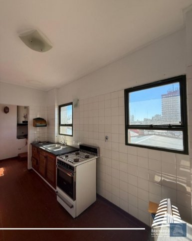Depto 2 dorm, 111m² con cochera — Centro
