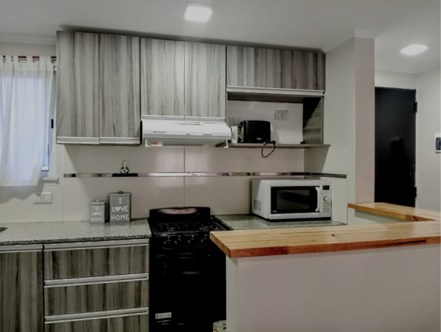 Depto 1 dorm, 50m² amoblado con cochera — 14 de Julio
